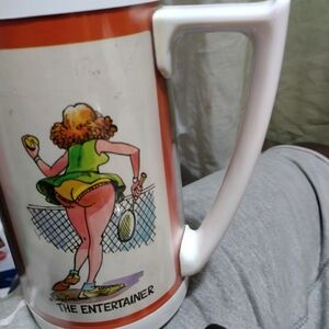 CUP with four different women on it.